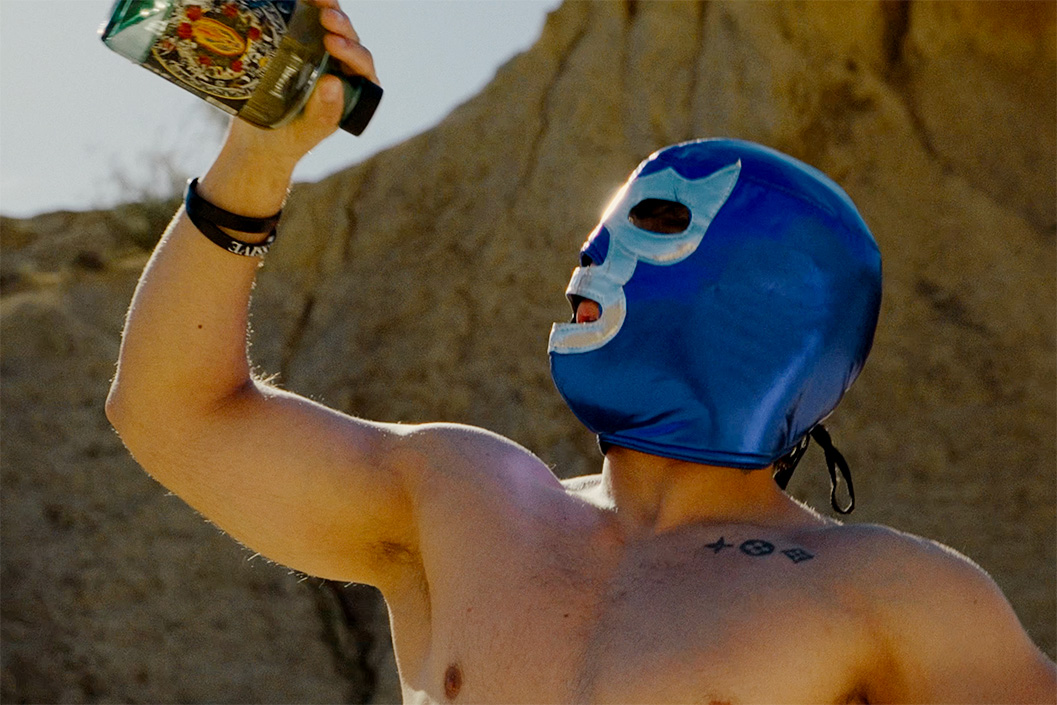 Mexican Wrestler with a Tequila Bottle